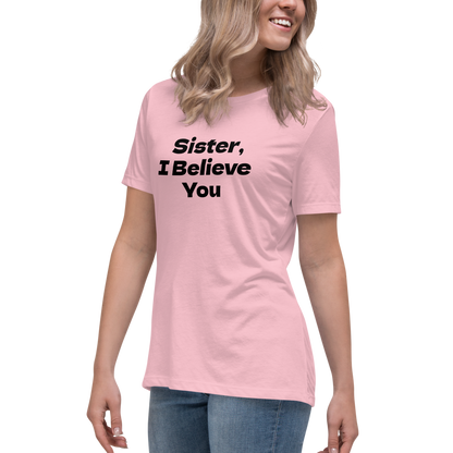 "Sister, I Believe You!" printed on a pink women's relaxed t-shirt worn by a female
