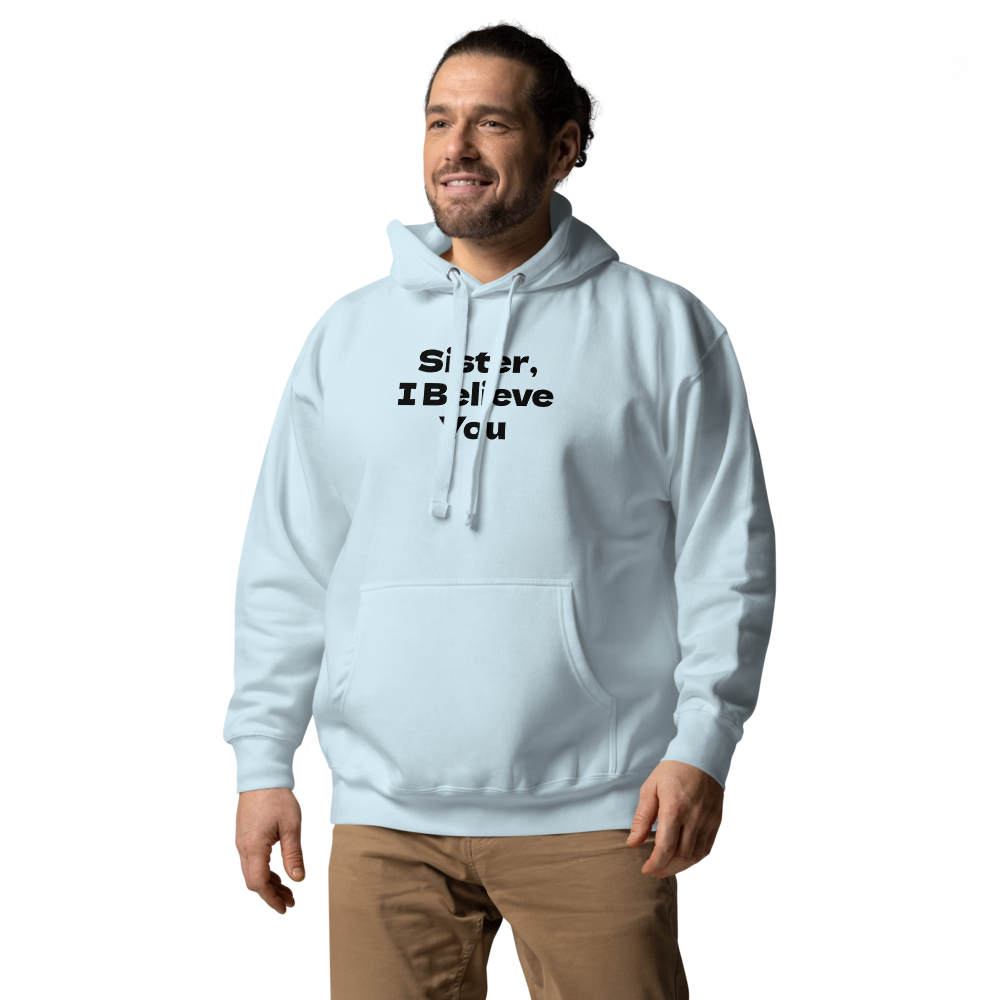 "Sister, I Believe You!" printed on a sky blue unisex hoodie worn by a male