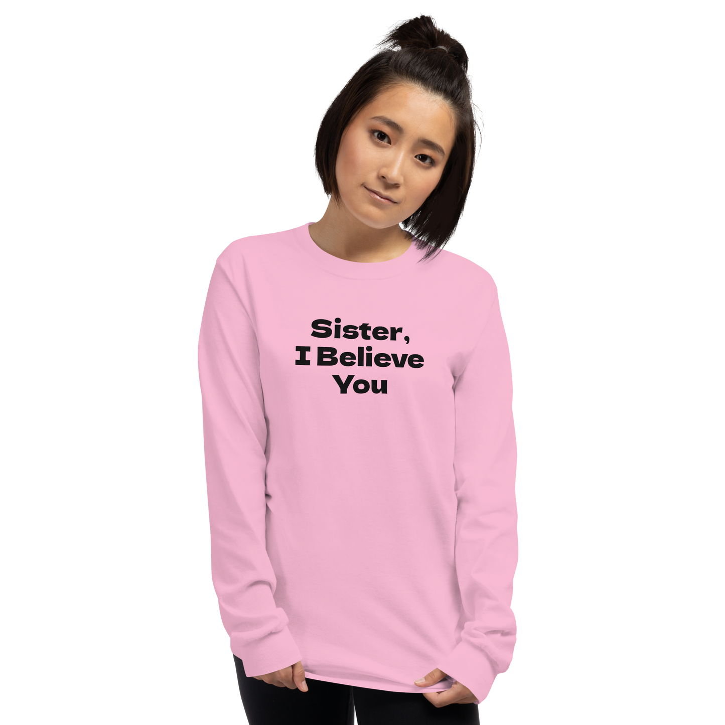 "Sister, I Believe You!" printed on a light pink men's long sleeve shirt worn by a female