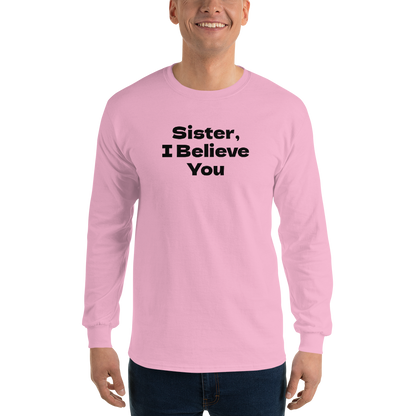 "Sister, I Believe You!" printed on a light pink men's long sleeve shirt worn by a male