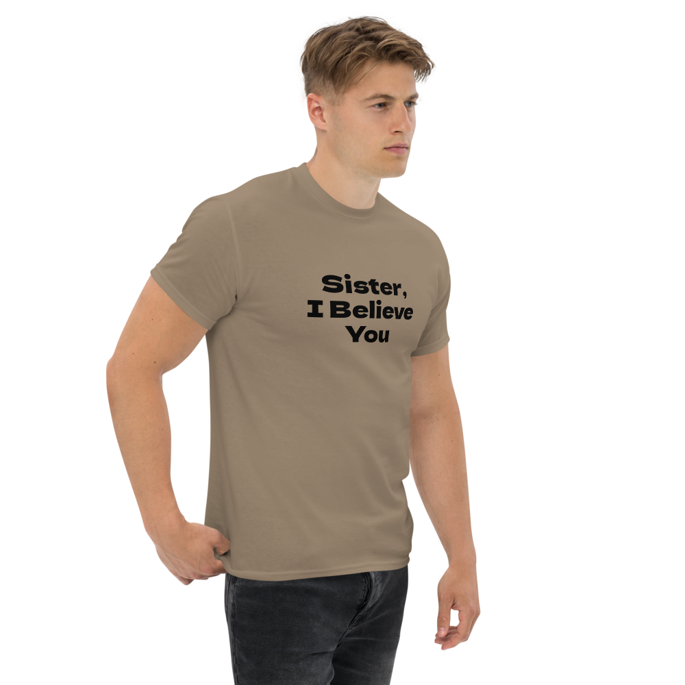 "Sister, I Believe You!" printed on a brown savana unisex classic tee worn by a male