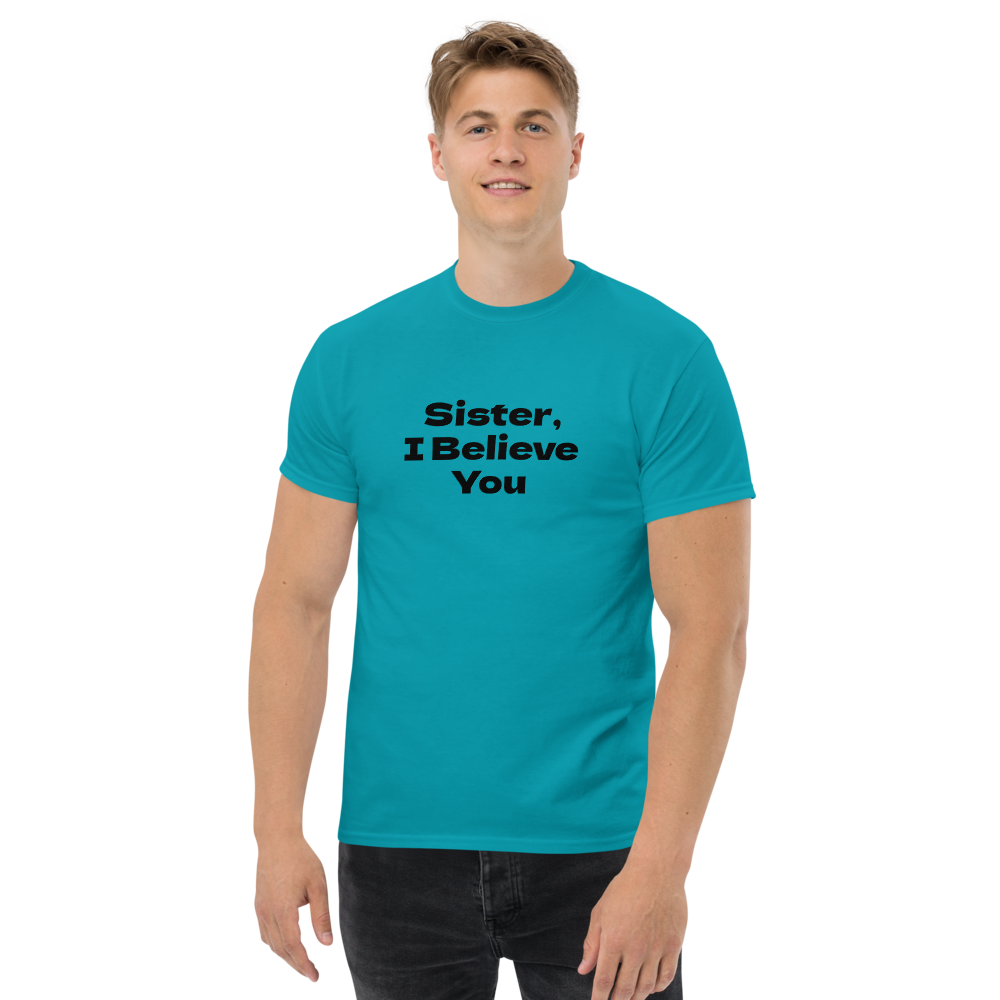 "Sister, I Believe You!" printed on a tropical blue unisex classic tee worn by a male