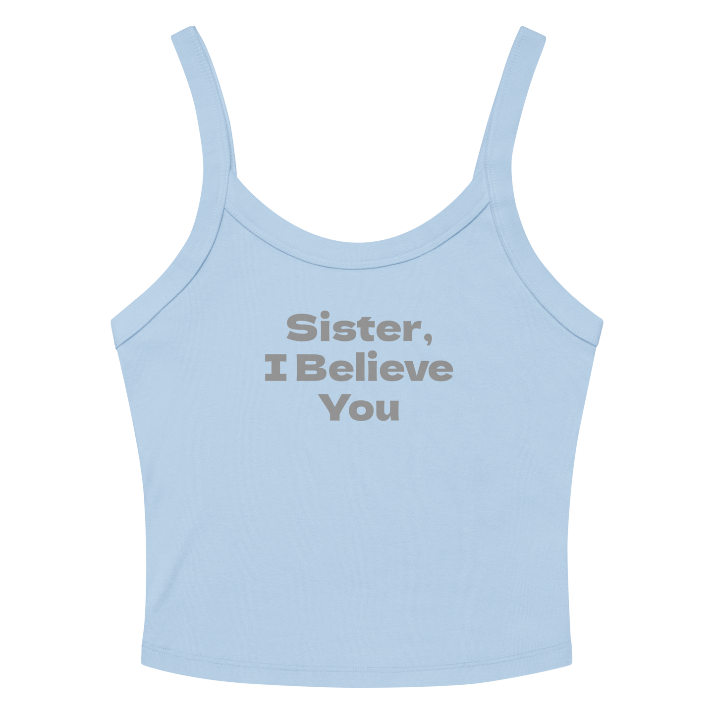"Sister, I Believe You!" printed on a solid baby blue blend women's micro-rib tanktop laying on a flat surface amongst sunglasses and shorts