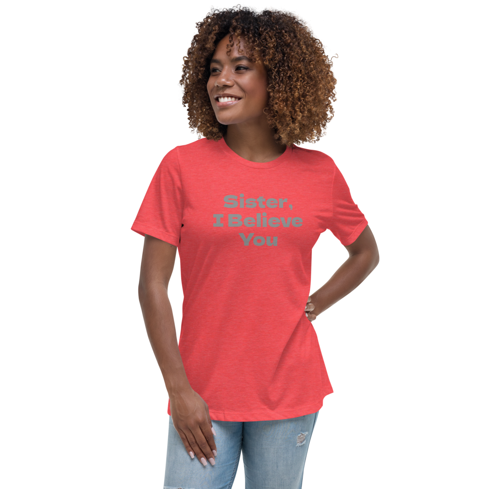 "Sister, I Believe You!" printed on a heather red women's relaxed t-shirt worn by a female