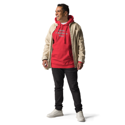 "Sister, I Believe You!" printed on a team red unisex hoodie worn by a male with a jacket on top
