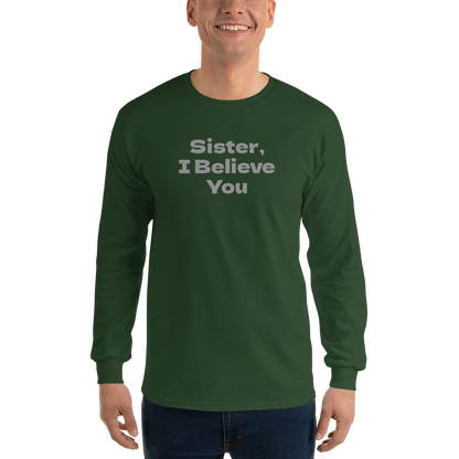 "Sister, I Believe You!" printed on a forest green men's long sleeve shirt worn by a male