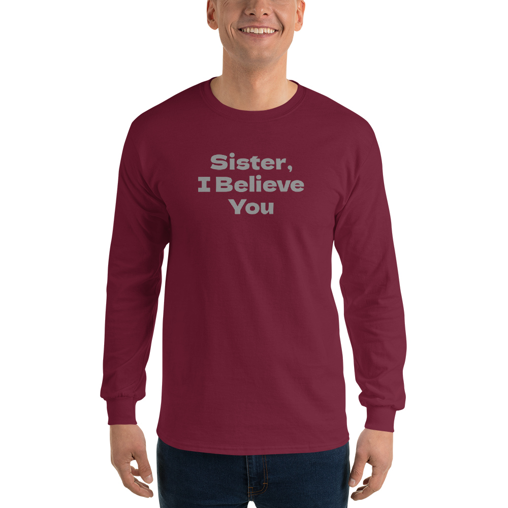 "Sister, I Believe You!" printed on a maroon men's long sleeve shirt worn by a male