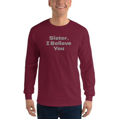 "Sister, I Believe You!" printed on a maroon men's long sleeve shirt worn by a male