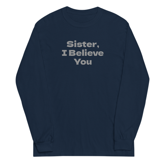 "Sister, I Believe You!" printed on a navy men's long sleeve shirt laying on a flat surface