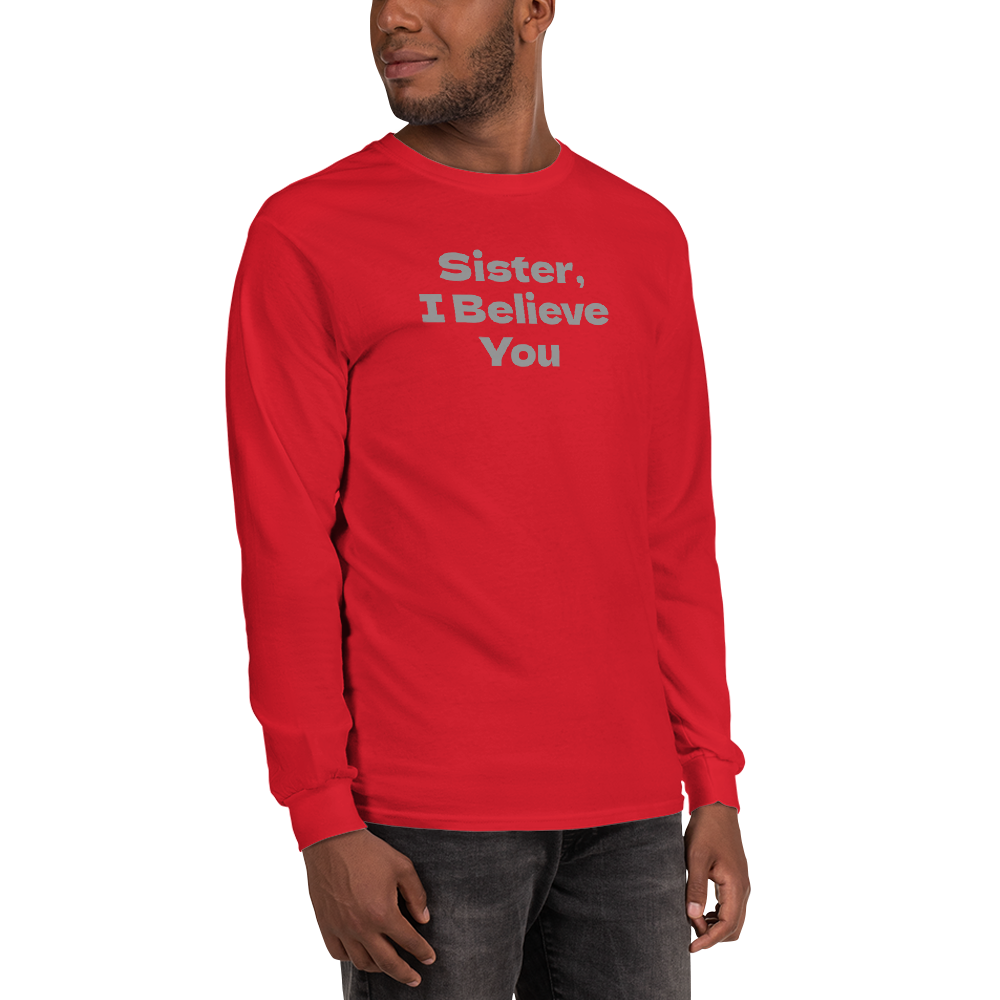 "Sister, I Believe You!" printed on a red men's long sleeve shirt worn by a male