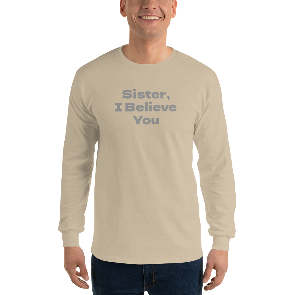 "Sister, I Believe You!" printed on a sand men's long sleeve shirt worn by a male