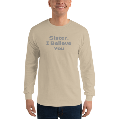 "Sister, I Believe You!" printed on a sand men's long sleeve shirt worn by a male