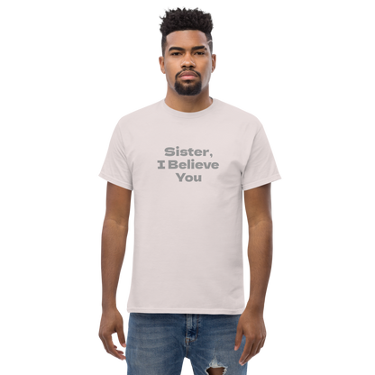 "Sister, I Believe You!" printed on a ice grey unisex classic tee worn by a male