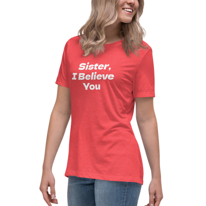 "Sister, I Believe You!" printed on a heather red women's relaxed t-shirt worn by a female