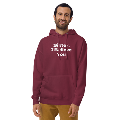 "Sister, I Believe You!" printed on a maroon warn by a male