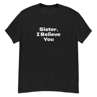 "Sister, I Believe You!" printed on a black unisex classic tee laying on a flat surface