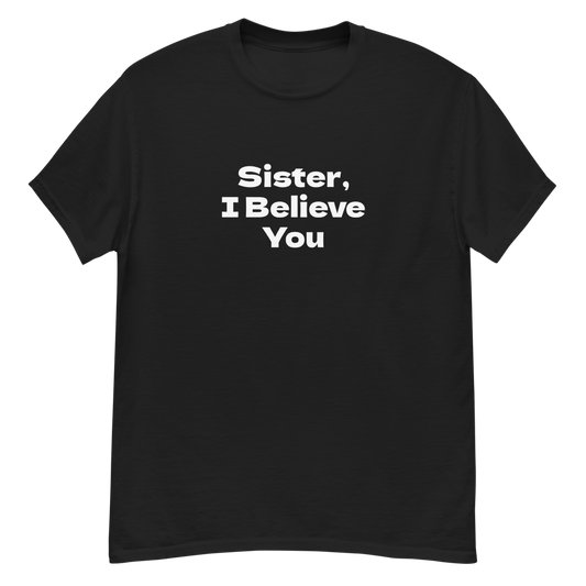 "Sister, I Believe You!" printed on a black unisex classic tee laying on a flat surface