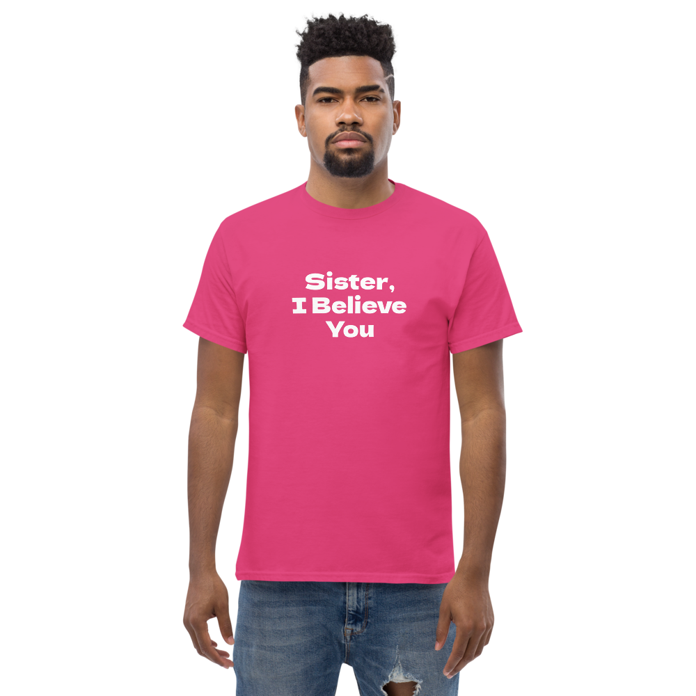 "Sister, I Believe You!" printed on a heliconia unisex classic tee worn by a male