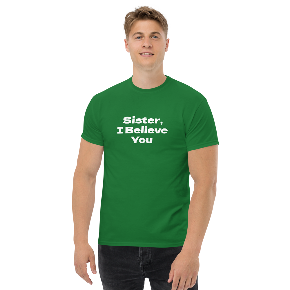 "Sister, I Believe You!" printed on a turf green unisex classic tee worn by a male
