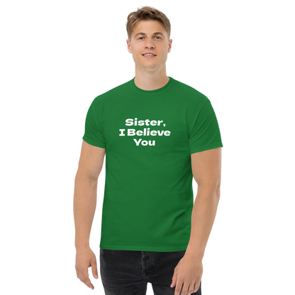 "Sister, I Believe You!" printed on a turf green unisex classic tee worn by a male
