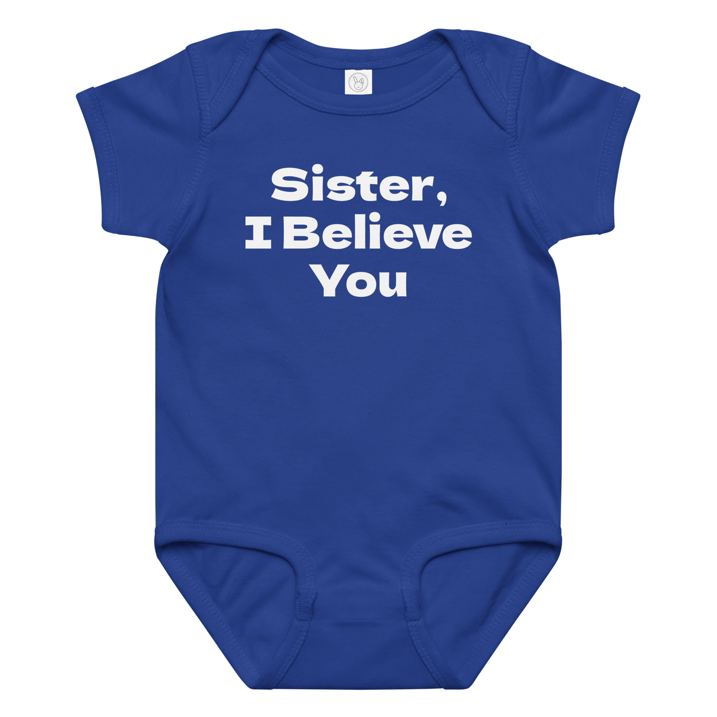"Sister, I Believe You!" printed on a royal baby jersey bodysuit laying on a flat surface amongst other clothes