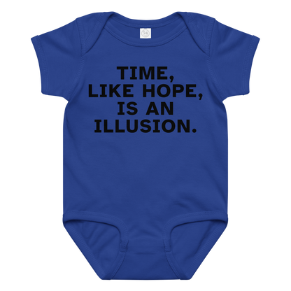 "Time, like hope, is an illusion" printed on a royal baby jersey bodysuit laying on a flat surface amongst other clothes