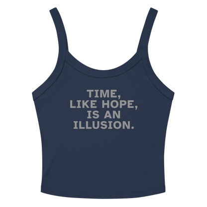 "Time, like hope, is an illusion" printed on a solid navy blend women's micro-rib tanktop laying on a flat surface amongst sunglasses and shorts