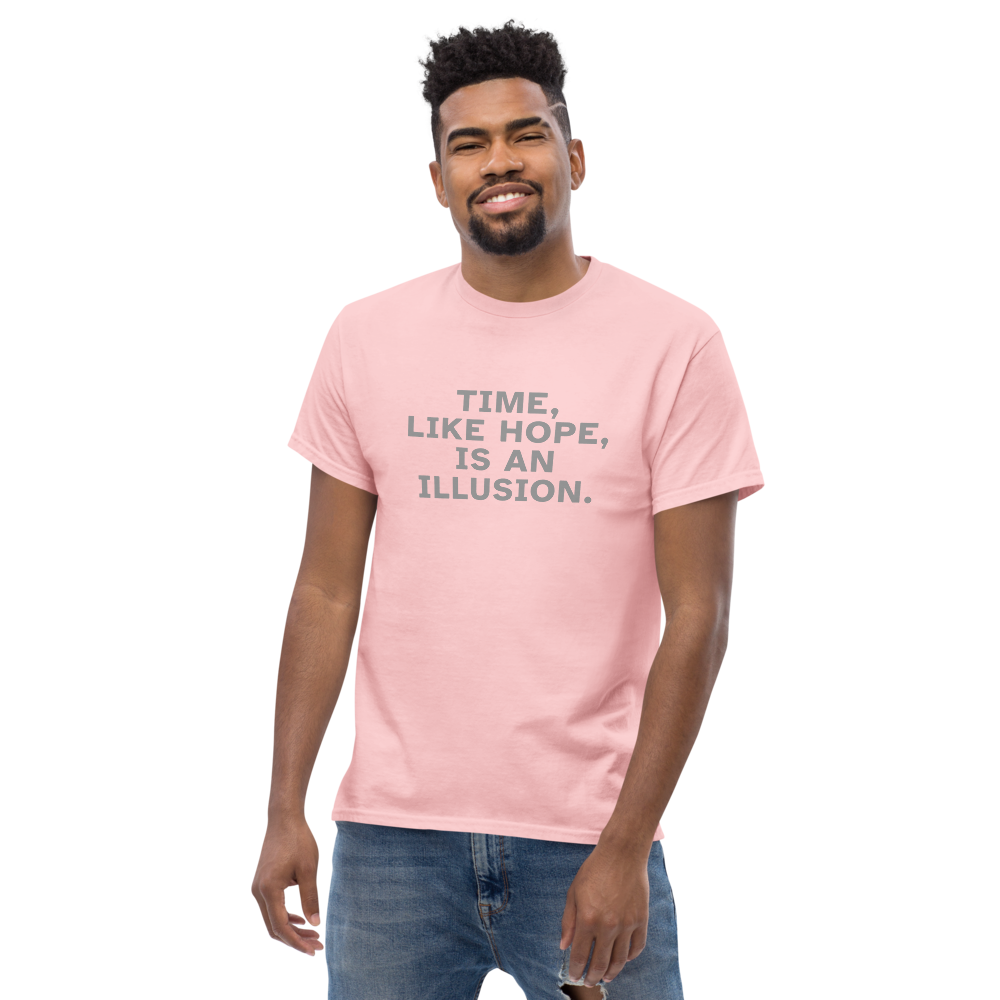 "Time, like hope, is an illusion" printed on a light pink unisex classic tee worn by a male