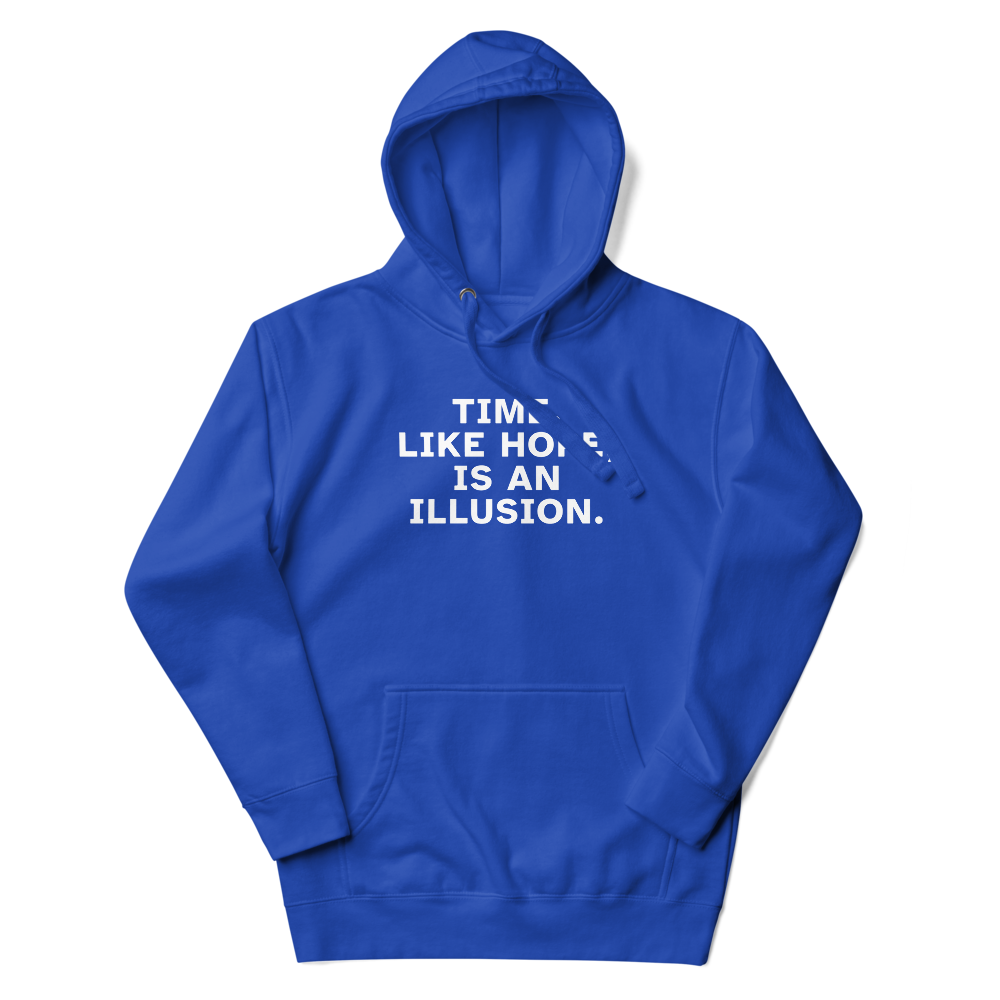 "Time, like hope, is an illusion" printed on a team royal unisex hoodie laying on a flat surface with the hood up