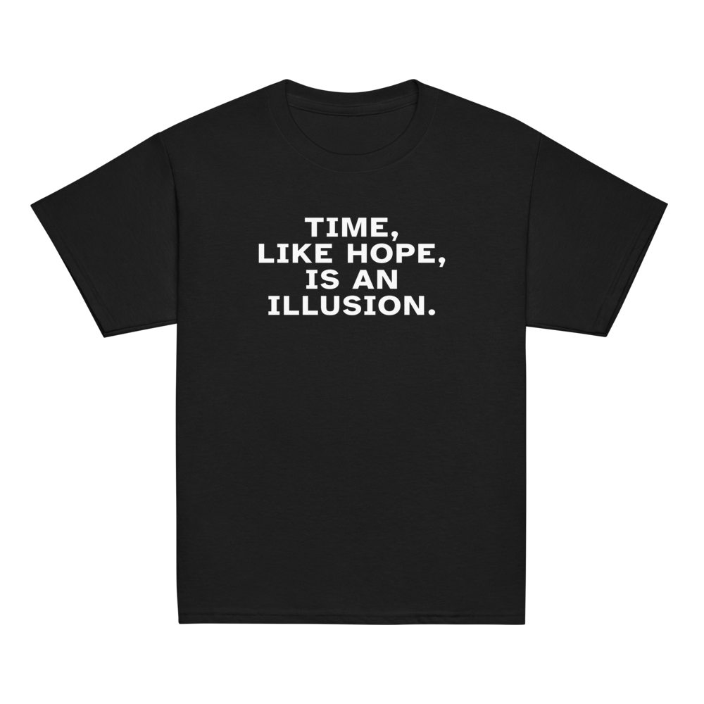 "Time, like hope, is an illusion" printed on a black youth classic tee laying on a flat surface