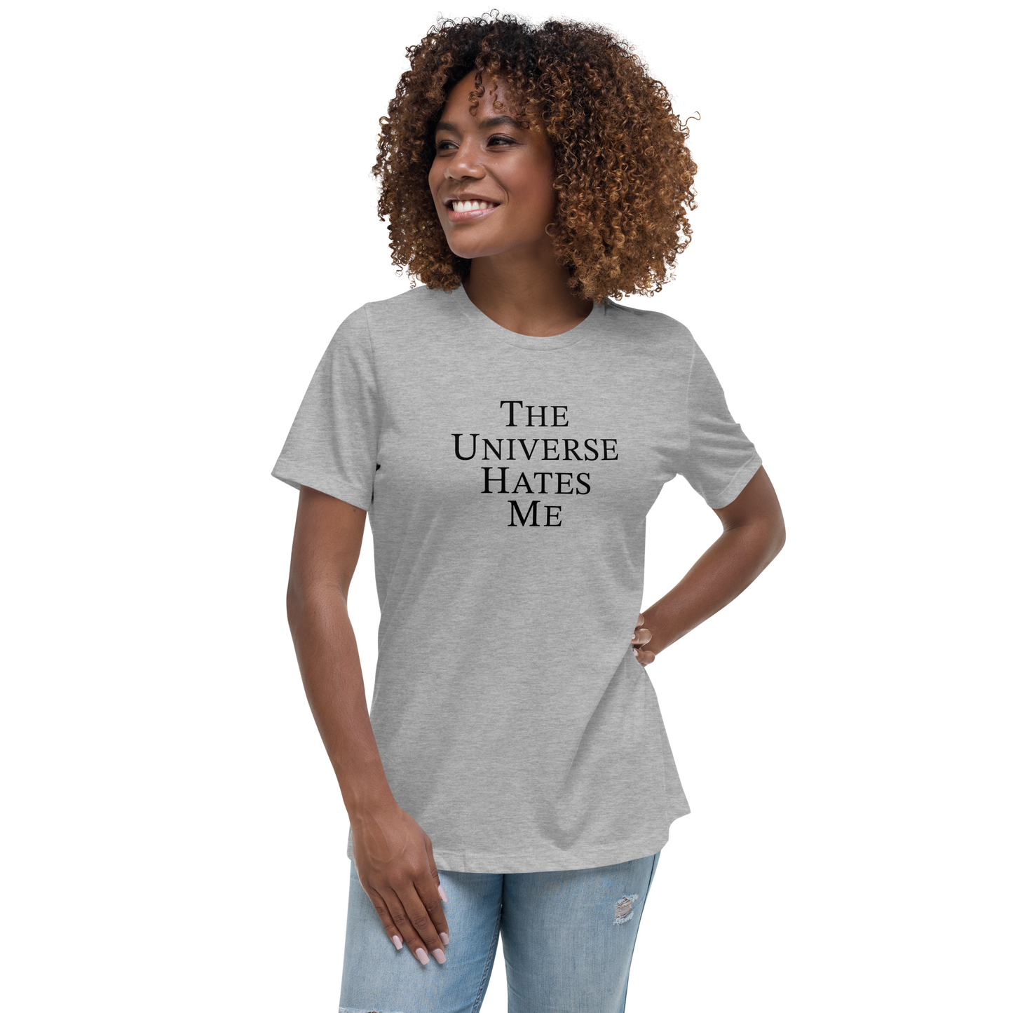 "The Universe Hates Me" printed on a athletic heather women's relaxed t-shirt worn by a female