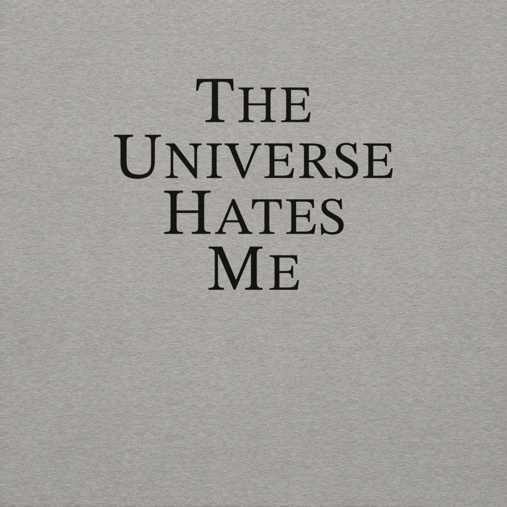 "The Universe Hates Me" printed on a carbon grey background