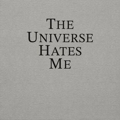 "The Universe Hates Me" printed on a carbon grey background