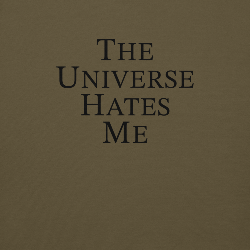 "The Universe Hates Me" printed on a military green background