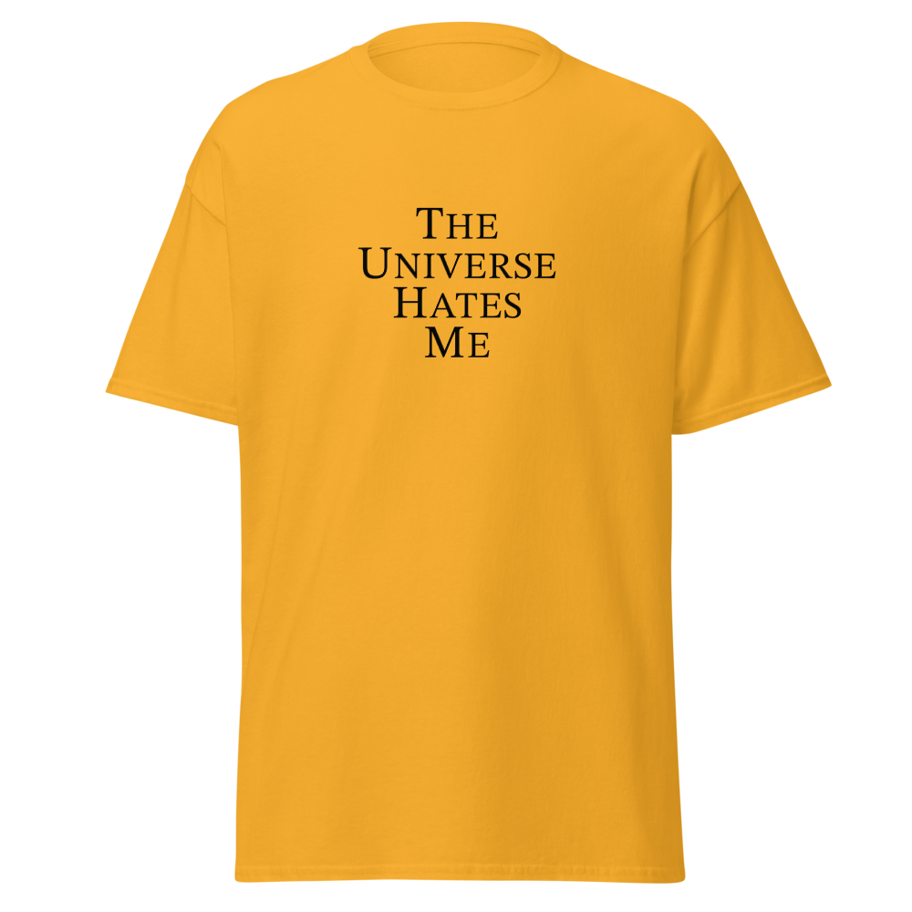 "The Universe Hates Me" printed on a gold on an invisible body