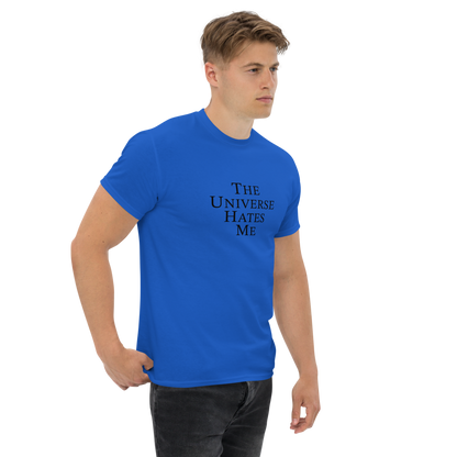 "The Universe Hates Me" printed on a royal unisex classic tee worn by a male