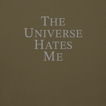 "The Universe Hates Me" printed on a military green background