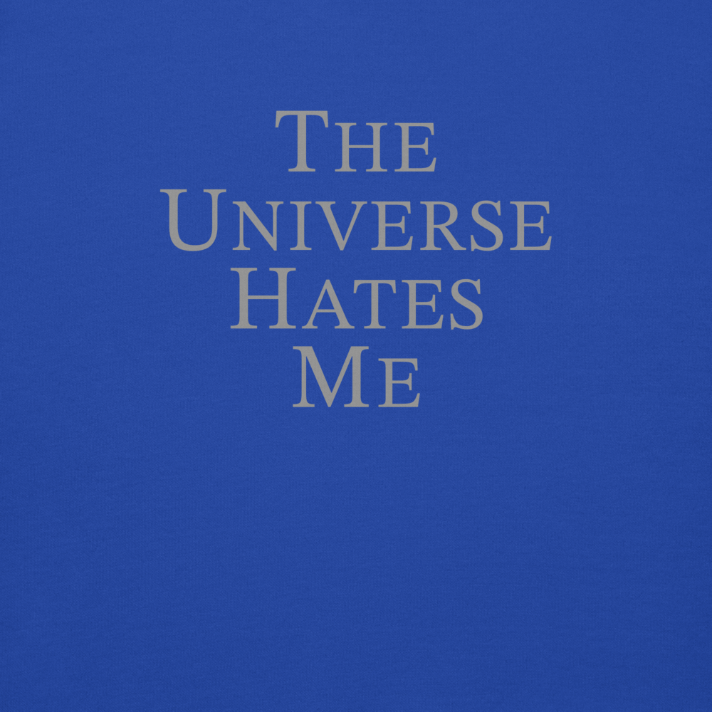 "The Universe Hates Me" printed on a team royal background