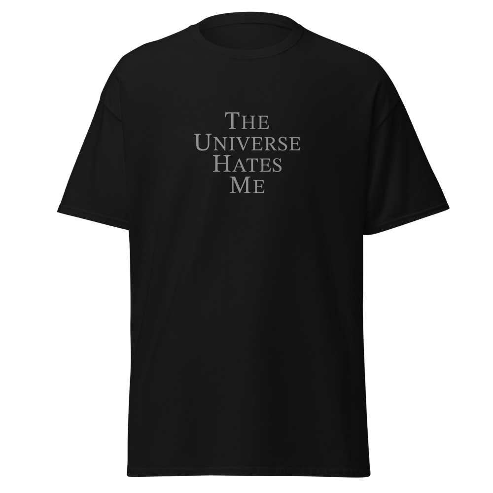 "The Universe Hates Me" printed on a black on an invisible body