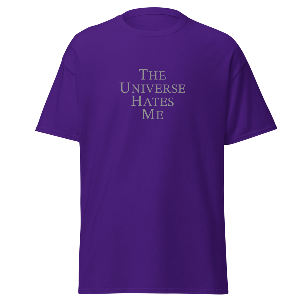 "The Universe Hates Me" printed on a purple on an invisible body