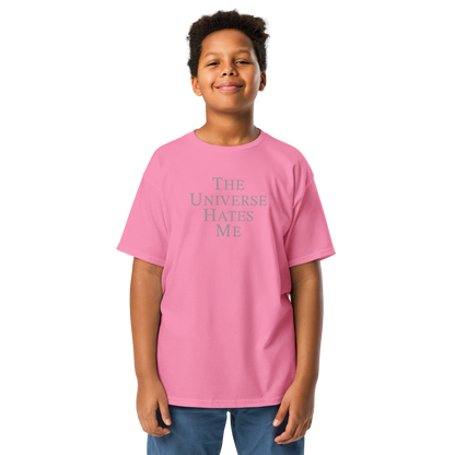 "The Universe Hates Me" printed on a azalea youth classic tee worn by a male