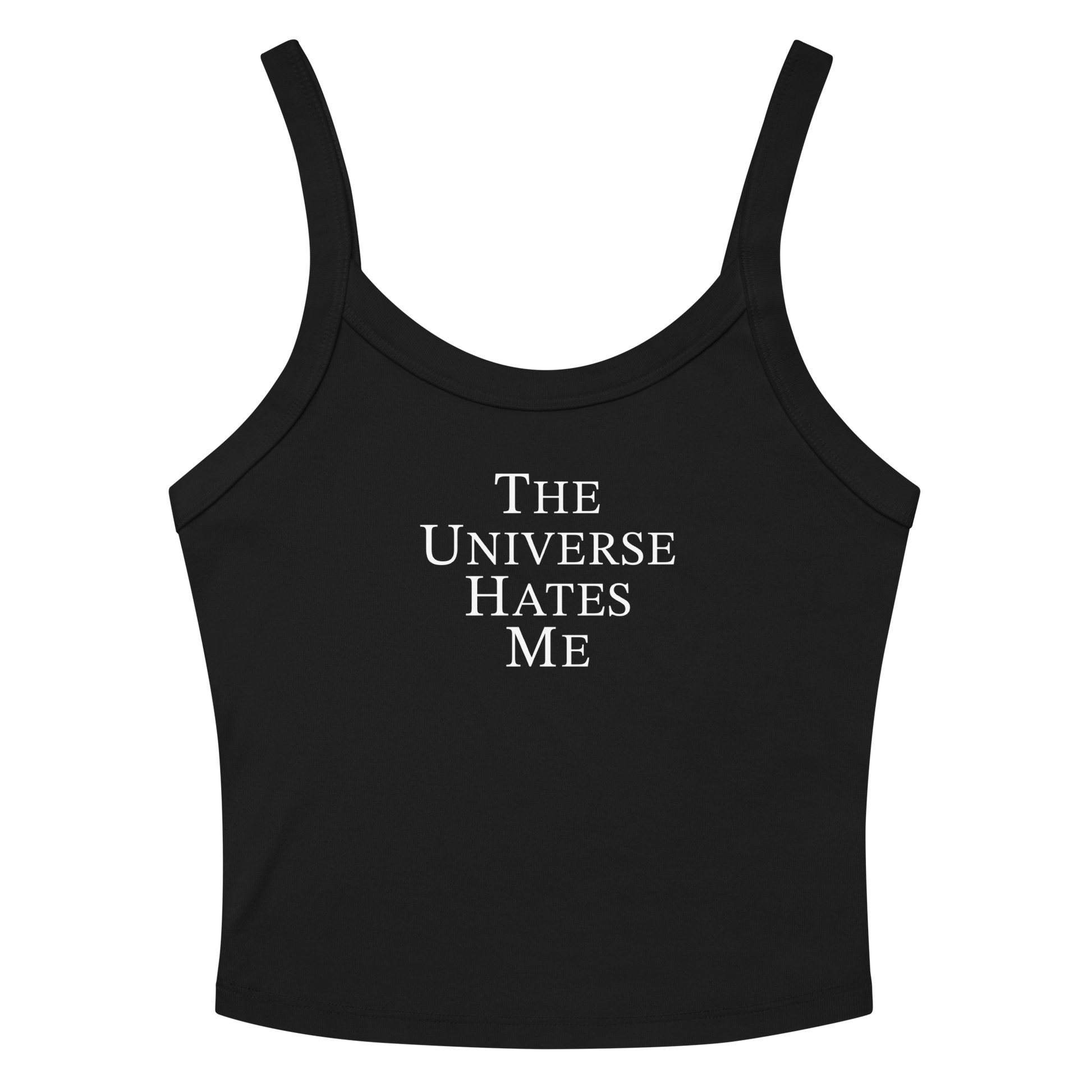 "The Universe Hates Me" printed on a solid black blend women's micro-rib tanktop laying on a flat surface amongst sunglasses and shorts