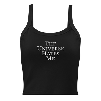 "The Universe Hates Me" printed on a solid black blend women's micro-rib tanktop laying on a flat surface