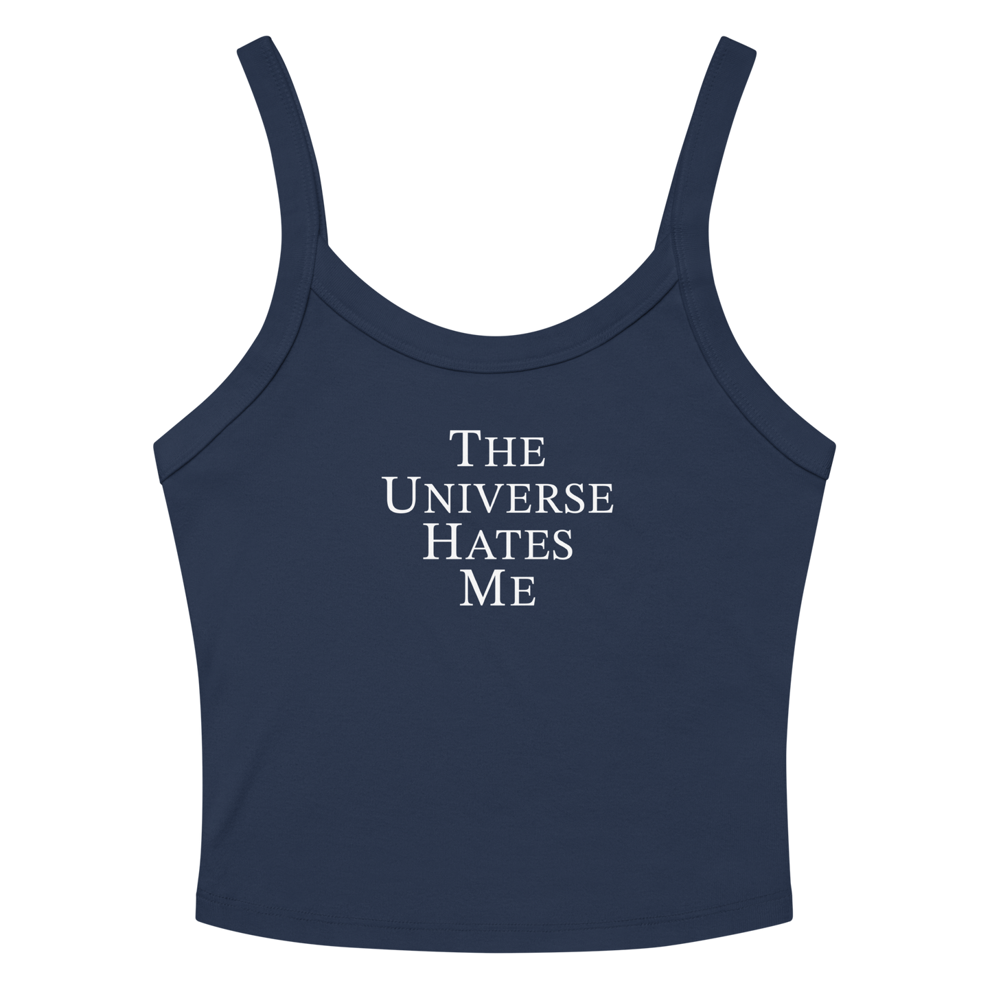 "The Universe Hates Me" printed on a solid navy blend women's micro-rib tanktop laying on a flat surface amongst sunglasses and shorts