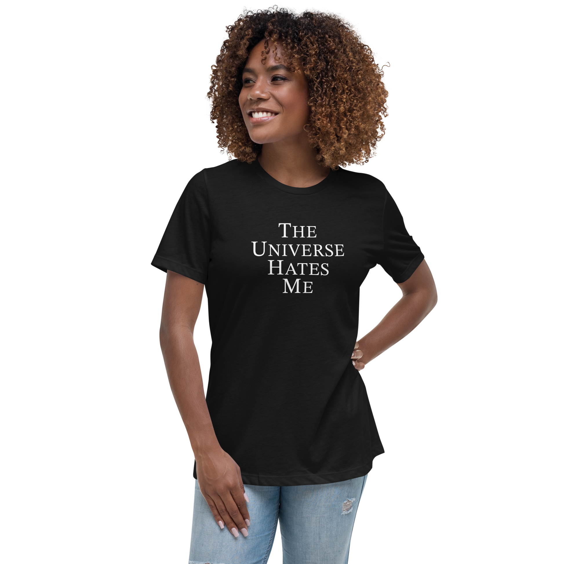 "The Universe Hates Me" printed on a black women's relaxed t-shirt worn by a female