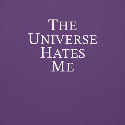 "The Universe Hates Me" printed on a purple background