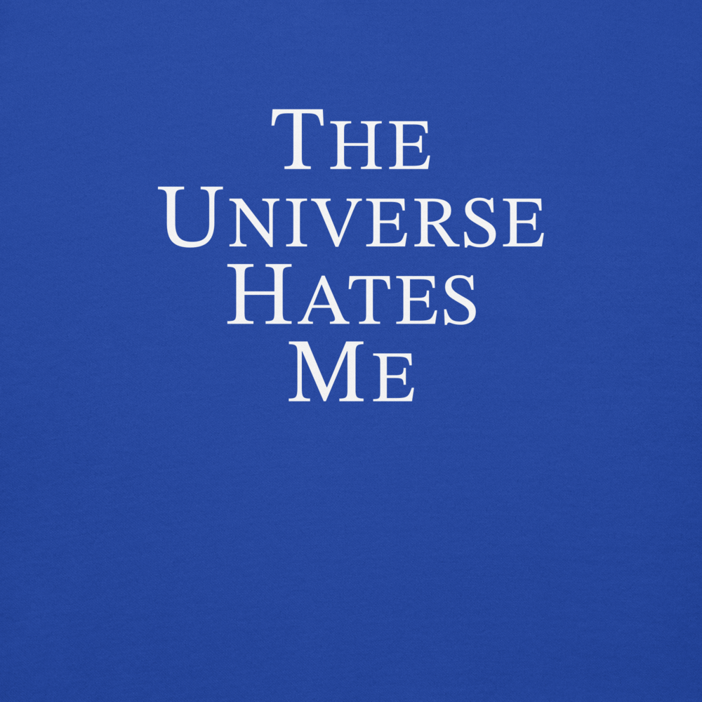 "The Universe Hates Me" printed on a team royal background