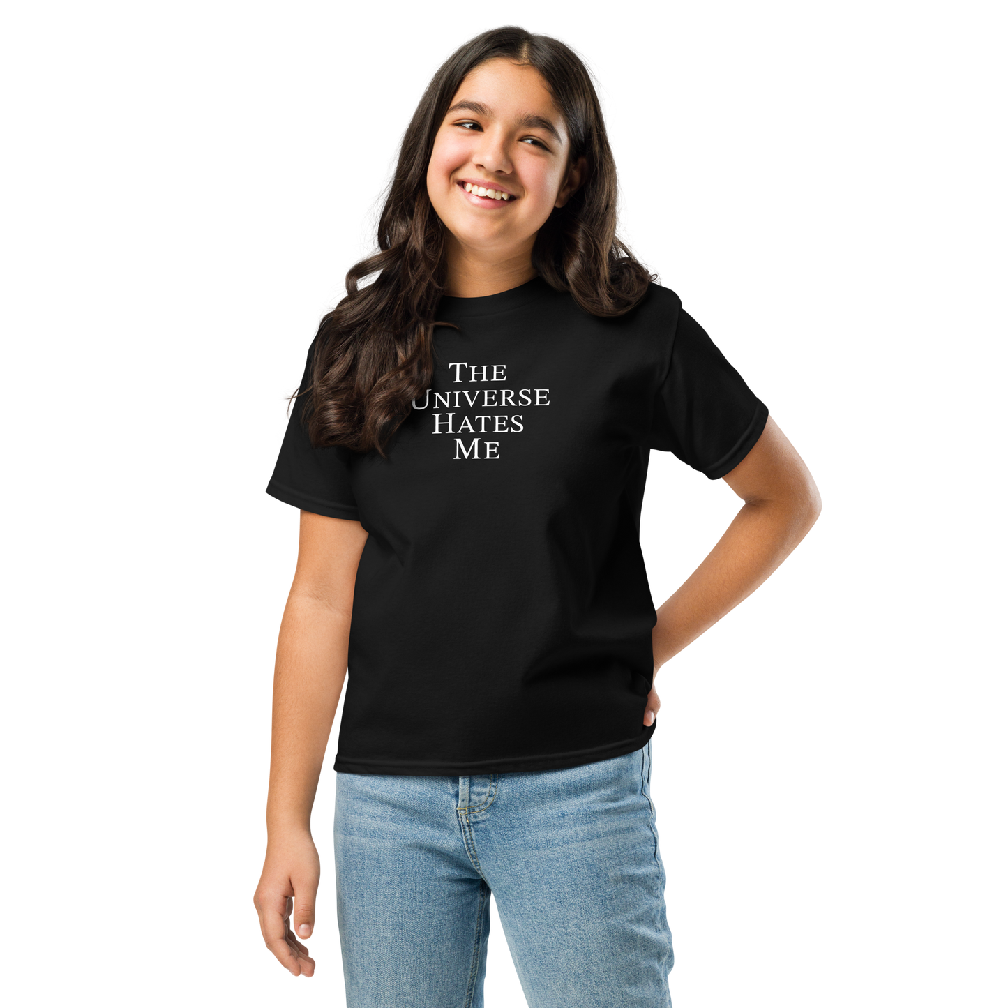 "The Universe Hates Me" printed on a black youth classic tee worn by a female