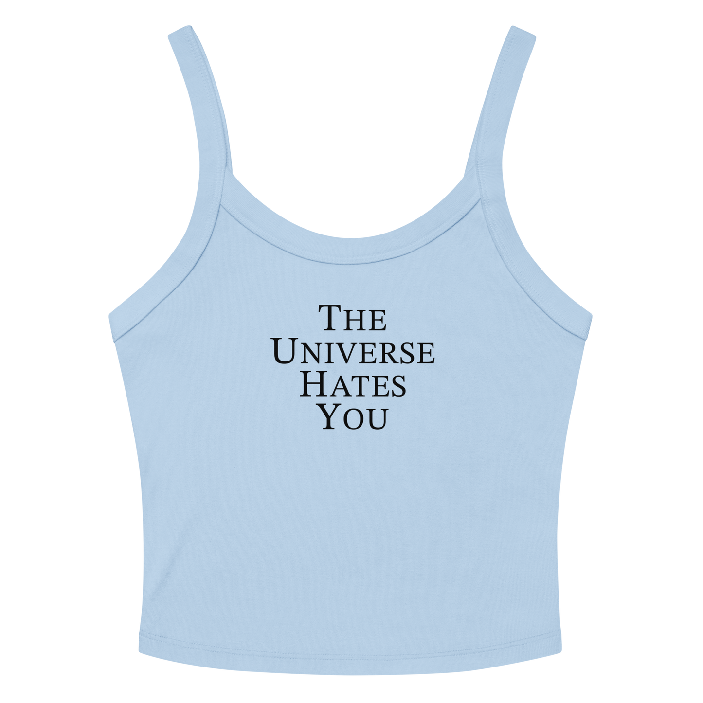 "The Universe Hates You" printed on a solid baby blue blend women's micro-rib tanktop laying on a flat surface amongst sunglasses and shorts
