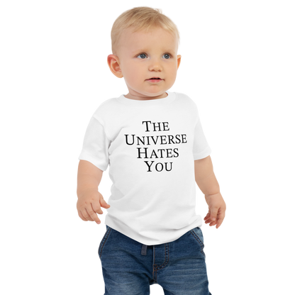 "The Universe Hates You" printed on a white baby jersey short sleeve tee worn by a male